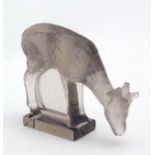 Lalique : a signed purple tinged glass deer grazing ,