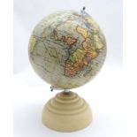 A mid 20thC 'Geographia' 8 inch Terrestrial Globe on cream Bakelite base.