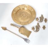 Assorted brass items to include charger, toasting fork, shovel,