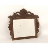 Petit miroir baroque rectangulaire horizontal en bois naturel à cadre sculpté et ajouré XVIIIe. H.