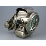 *A 'Silver King' oil-powered bicycle lamp by Joseph Lucas, dating from the 1920s, the lamp has