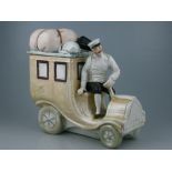 *Ceramic Sweet Jar in the guise of a chauffeur and his open-drive saloon motor-car, bisque with