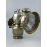 *A 'Lustra' acetylene-gas-powered bicycle lamp by Joseph Lucas, in good condition with its