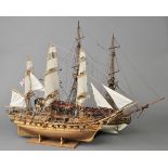 *Model Ship. A well-constructed wooden ship, with three fully rigged masts, fourteen guns, planked