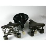 *Three Motorcycle Saddles, having heavy duty double-springs and leather tops (3)