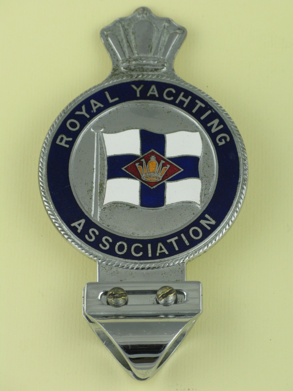 *Royal Yachting Association. A chromium-plated and four-colour enamel car badge with a badge bar