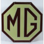 *M.G. An octagonal hanging showroom enamel sign, with hanging holes' top and bottom and original