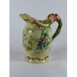 *Daisy Bell. A pitcher by Crown Devon (Shorter & Son), having a moulded depiction of a tandem and