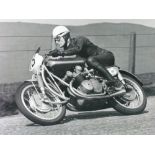 *Three large monochrome photographs. Geoff Duke on his 500cc Norton winning the 1950 IOM TT, Les