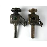 *Two candle-powered bicycle lamps, of French manufacture, with coloured side glasses and sprung rear