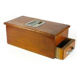 *A point of sale cash drawer, in varnished oak, with copper change insitu (1)