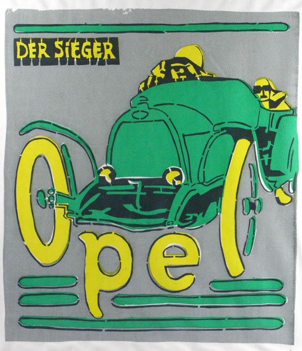 *Opel. An inspired depiction of a racing at speed, printed in green and yellow on a silken canvas,