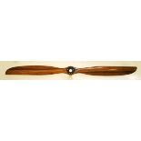 *Avro 504 - 80 HP Gnome. A walnut two-blade propeller, circa 1915, stamped 2744 DIA, 1829 PITCH,