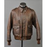 *USAF Flying Jacket. A WWII A2 brown leather jacket, with tailor's label for 'Type A-2 Property