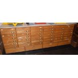 *Chest of drawers. A large 20th century 'shop counter style' chest of drawers (with contents),