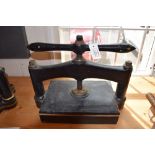 *Bookpress. A cast iron bookpress, finished in black, platen approximately 37.5 x 25.5cm (14.75 x 10