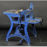 *Board Cutter. Large heavy cast iron free standing board cutter by Harrild & Sons, finished in blue,