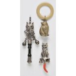 *Babies Rattle. An Edwardian silver babies rattle in the form of a seated cat, with two bells
