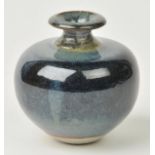 *Mulcahy (Louis). Squat bottle vase, all-over blue glaze, unglazed base, original potter's label