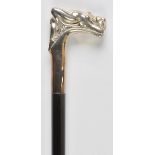 *Walking stick. An Art Nouveau style walking stick with silver top formed as a reclining nude,