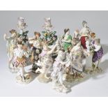 *Porcelain figures. A collection of 18th-century-style porcelain figures, including a Meissen-