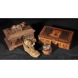*Carved cats. A Swiss carved jewellery box, the lid carved with a playful cat clutching a ball of