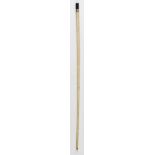 *Walking cane. A 19th-century whale bone cane with cylindrical baleen knop and white metal collar,