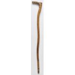 *Walking cane. A 19th-century folk art walking stick probably carved from beech, the integral handle