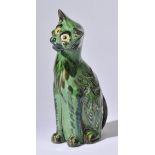 *Brannam (C.H.). An early 20th-century pottery cat, c.1910, modelled in the seated position with
