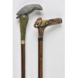 *Walking stick. A late 20th-century rustic walking stick, with deer antler handle carved with a Gold