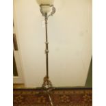 *Lamp. An Edwardian electroplated standard lamp, with telescopic action and pierced rococo style