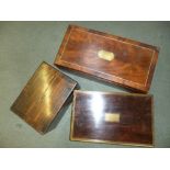 *Boxes. A Victorian rosewood writing box, inlaid with brass, the hinged lid enclosing beize fall and