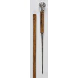 *Walking cane. A late 19th-century French swordstick, with white metal knop embossed with flowers on