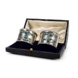 *Art Nouveau. A pair of silver napkin rings by William Hassler, Birmingham 1905, with finely