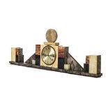 *Clock Garniture. An Art Deco marble clock garniture set, the clock with circular brass dial,