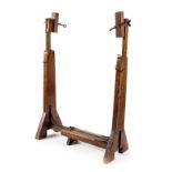 *Needlework frame. A wooden embroidery floor stand, circa 1900, a large adjustable wooden stand with