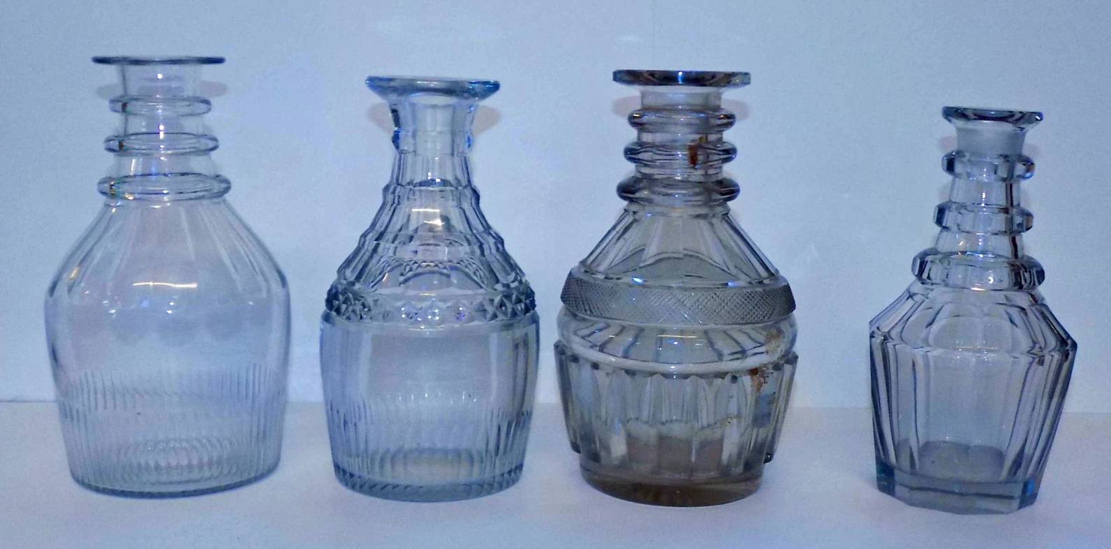 *Decanters. A mixed collection of Georgian glass decanters, including triple neck decanters (three - Image 3 of 3