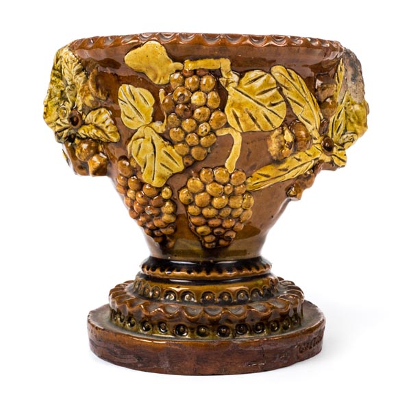 *Bideford. A Bideford pottery pedestal bowl by George Fishley, circa 1890, modelled with acorns,