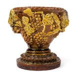 *Bideford. A Bideford pottery pedestal bowl by George Fishley, circa 1890, modelled with acorns,