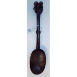*Spoon. A Dan tribe carved wood spoon from Liberia, the terminal carved with a head, 44cm long (1)