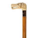 *Walking Cane. A 19th century walking stick with carved ivory dog's head handle, silver collar