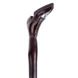 *Walking Cane. An Edwardian walking stick carved from a single piece of rosewood, the handle