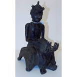 *Figure. A Benin bronze figure modelled as a seated tribesman weaving, 22.5cm high (1)