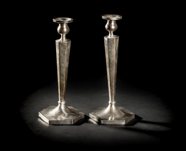 *Judaica. A pair of sterling silver 'Sabbath' candlesticks, circa 1920s, each of hexagonal form with