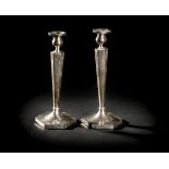 *Judaica. A pair of sterling silver 'Sabbath' candlesticks, circa 1920s, each of hexagonal form with