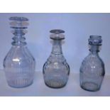 *Decanters. A mixed collection of Georgian glass decanters, including triple neck decanters (three