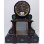 *Clock. A Victorian black slate mantel clock, the architectural case inset with malachite