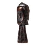 *Head. A Fang tribe carved wood head from Gabon, carved with elongated face, 32cm high (1)