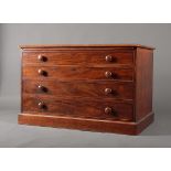*Plan chest. An early 19th century plan chest, mahogany, straight front with four drawers, on a