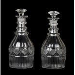 *Decanters. A pair of George III Irish glass decanters, circa 1820, mallet form with diamond cut